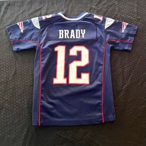 Rare official NFL New England Patriots Tom Brady #12 football jersey. Boys M